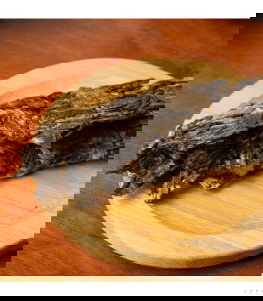 Pu Erh Mansong Mengla trozo de disco detalle